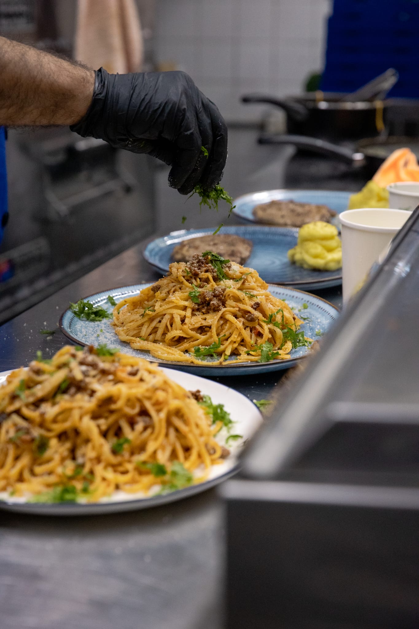 Spaghetti finished with fresh herbs